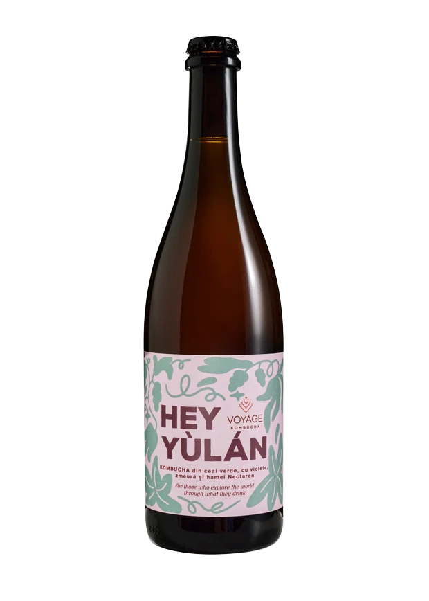 Hey Yùlán kombucha bottle with a pink and green label